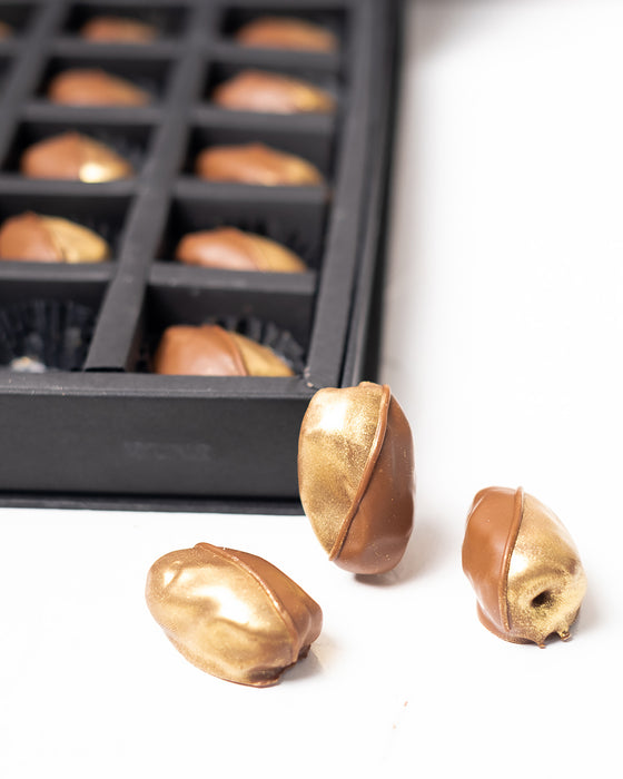 Milk chocolate and Gold Coated Dates